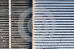 Side-by-side comparison of a dirty and clean automotive cabin filter