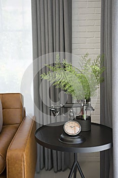 Side table with black table light bedside brown leather sofa