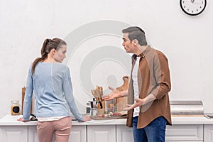 side view of adult couple having argument