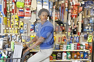 Side view of African American in hardware store