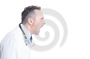 Side view of angry medic or doctor yelling and shouting