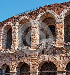 Side view of arches and details of famous ancient roman amphitheatre Arena di Verona, Italy, Europe. The amphitheater is