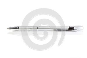 Side view of a ballpoint pen, isolated on a white background. Close up