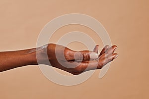 Side view of beautiful african woman hand with palm up