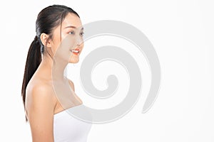 Side view of Beautiful Asian woman looking at camera smile with clean and fresh skin Happiness and cheerful with positive