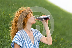 side view of beautiful redhead woman