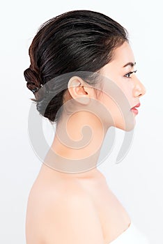 Side view of Beauty Woman face Portrait, Beautiful Young Asian Woman with Clean Fresh Healthy Skin, Facial treatment. Cosmetology