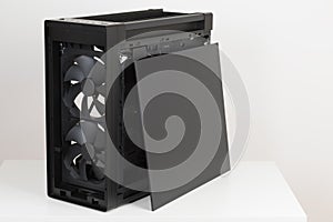 Side view of big tower, PC case, chassis, without upper , front, and glass left panel. Two pre-installed system extra-thick 200