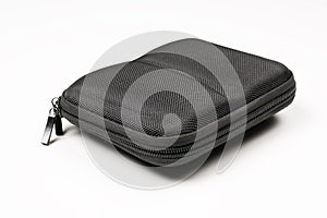 Side view of black hard case for batteries for drone on white background