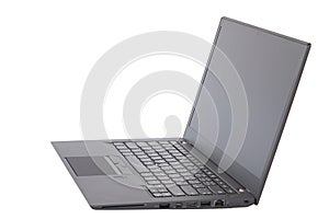 Side view of black laptop with black screen isolated on white ba