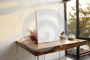 Side view of a blank white unprimed canvas on the wall in a modern simple interior.