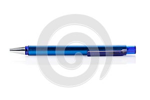 Side view of a blue ballpoint pen, isolated on a white background. Close-up