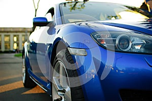 Side View of the Blue Sport Car, Mirror Close-up, Details of Automobile Concept