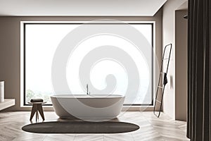 Side view on bright bathroom interior with bathtub, shower