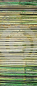 Side view of a bunch of compact discs