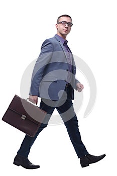 Side view business man holding brief case and walking