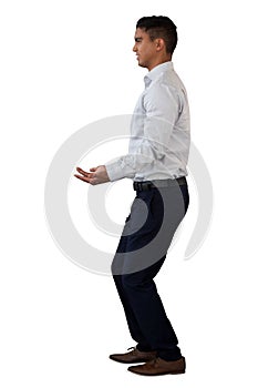 Side view of businessman carrying something