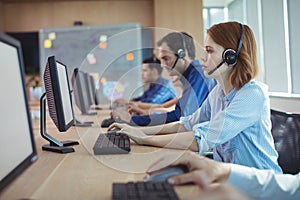 Side view of businesswoman working at call center