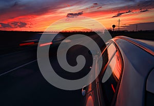 Side view of car at sundown