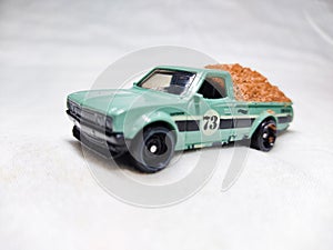 Side View of Car Truck or Utes taking Sand