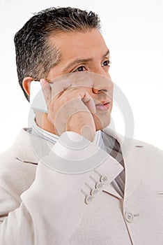 Side view of ceo talking on cell phone