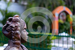 Side view of a changxi statue who is the lunar goddess in chinese mythology. Buddhism and enlightment concept photo