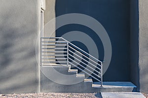 Side view of concrete steps and railing in modern building