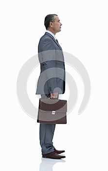 Side view.confident businessman with briefcase.