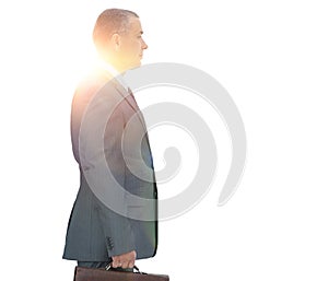 Side view.confident businessman with briefcase.