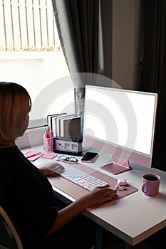 Creative woman working with computer in modern office.
