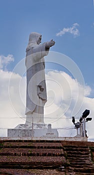 Side view of Cristo Blanco, a statue is located on the top of Pukamoko Hill, (Cusco Peru)