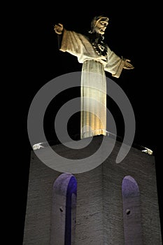 Side view of Cristo-Rei statue in Lisbon, Portugal. photo