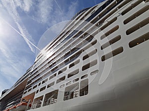 Side view of cruise ship on the blue sky background