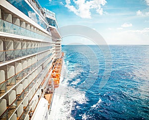 Side view of cruise ship on the blue sky background with copy space, blue tone