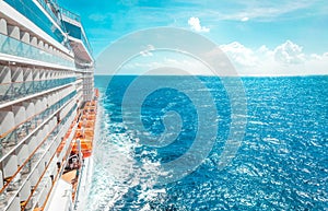 Side view of cruise ship on the blue sky background with copy space, blue tone