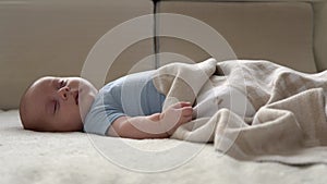 Side View Cute Kid 2 Month Newborn Boy Sweetly Sleeping After Bath Shower On White Soft Bed. Baby Child Napping Time
