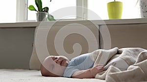 Side View Cute Kid 2 Month Newborn Boy Sweetly Sleeping After Bath Shower On White Soft Bed. Baby Child Napping Time