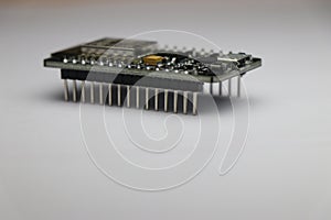 Side view of development board which is used in making IOT projects and other mini electronic projects in white background