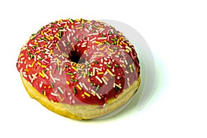 Side view of donut with sprinkles isolated on white background