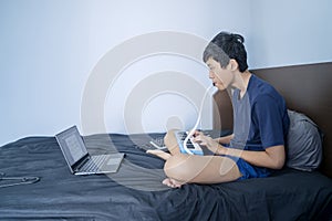 Elementary student practicing pianica at home
