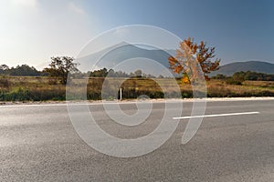 Side view of empty asphalt road in mountain area