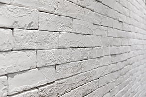 Side view of empty white brick wall in room. textured and background