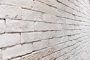 Side view of empty white brick wall in room. textured and background