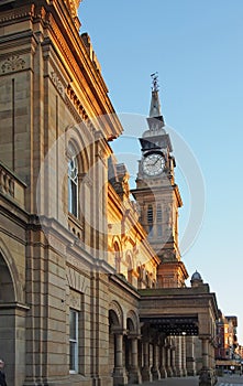 Side view of the facade and clock tower of the historic victorian atkinson building in southport merseyside