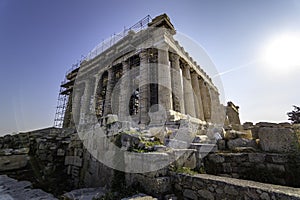 Side view of the facade of the Partenon in Athens surrounded by scaffolding, Greece photo