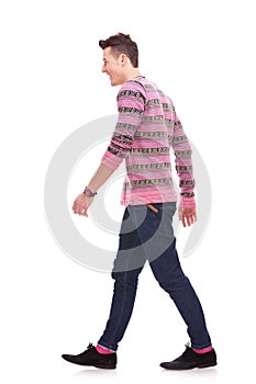 Side view of a fashion man walking