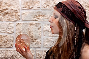 Side view of a female fortune teller