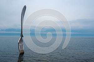 Side view of fork of Vevey, Lake Geneva on cloudy sky background