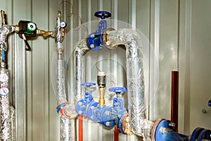 Side view of the glycol circuit pipelines of the industrial air conditioning system