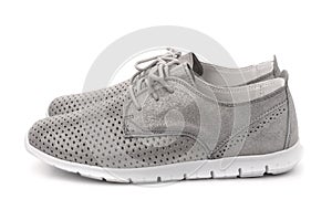 Side view of grey leather sport shoes